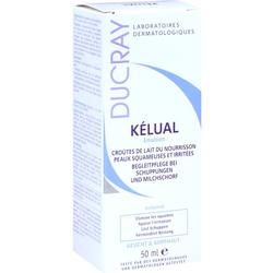 Eine weiße Verpackung mit blauer Schrift der Marke "Ducray Kélual".