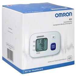 Eine Box mit einem automatischen Blutdruckmessgerät von Omron für das Handgelenk.